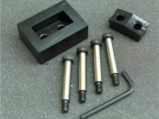 Custom Dandy Die Set 0.906" by 2.913"  for Mencom ILME model CZI 25L,  Includes drill guide holes per spec.   Recommended maximum 14 gauge stainless.   Must be pulled hydraulically. 