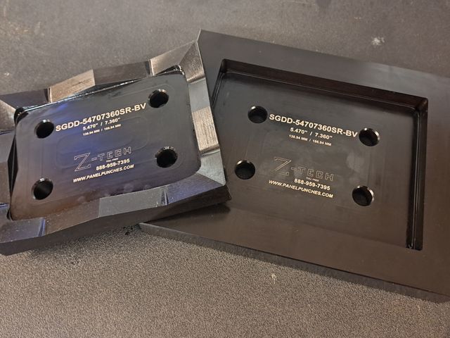 Custom Super Giant Dandy Die Set 5.470" x 7.360" with standard radius corners.  For SEL-751 Feeder Protection Relay panels.  Requires the BV-200-6 Balanced Drive System, 2ea CYL-200D Cylinders and a hydraulic power source for operation.