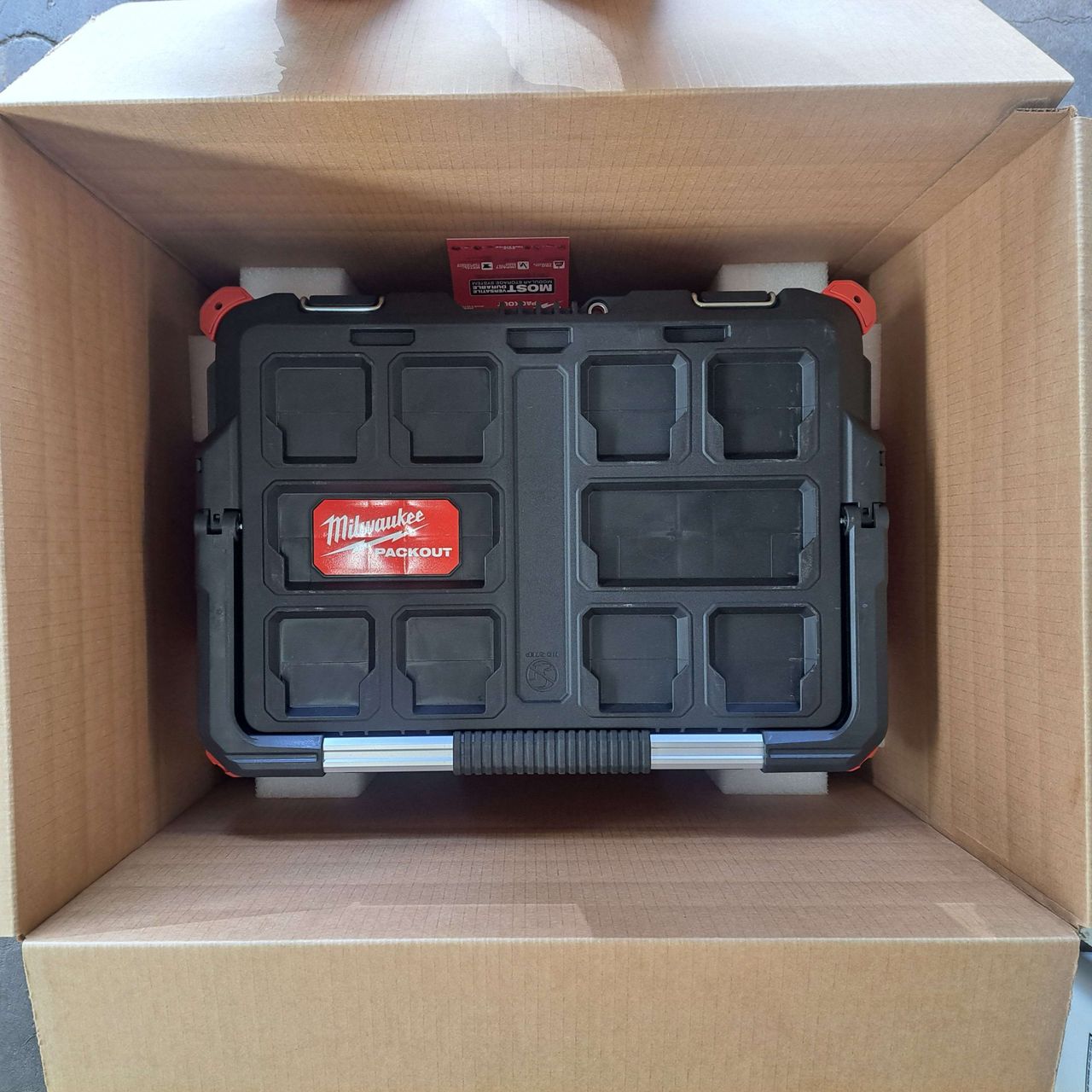 Place Large packout onto foam corners previously installed...
