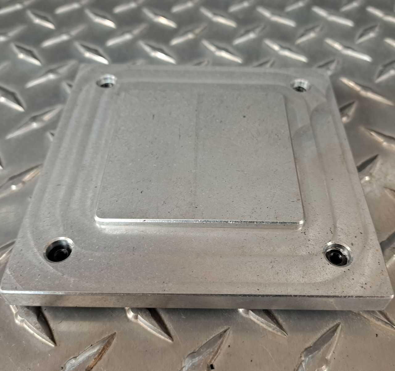 Back Side of Drill Guide that will seat in the panel opening after punching