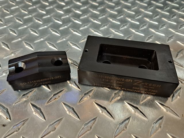 Dandy Dieset, 1.318" by 2.640" with 0.079" radius corners.  For GFI receptacle, includes drill guide for mounting holes
